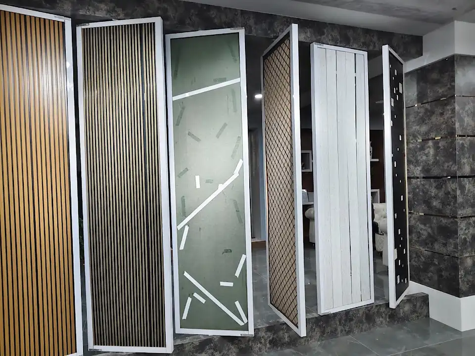 Row of decorative wall-panel samples in wood, lattice and mosaic finishes