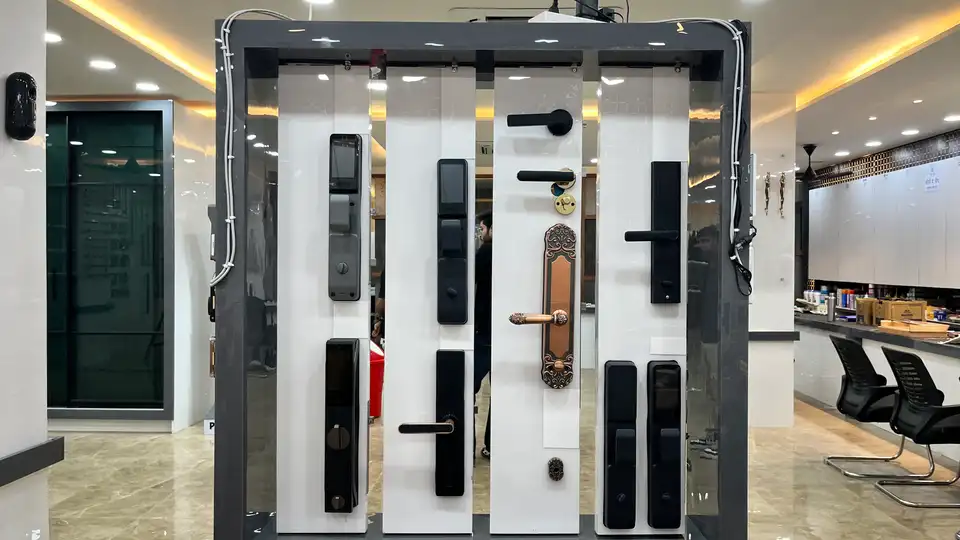 Wide hardware wall with designer handles, knobs and fittings on display